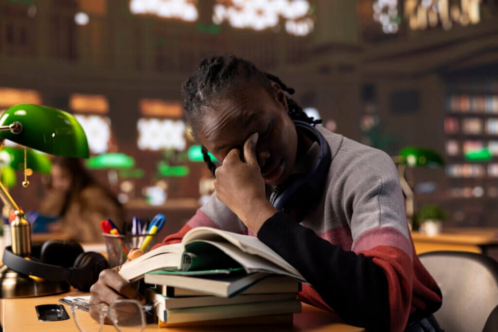 how to beat exam anxiety — student studying for exams.