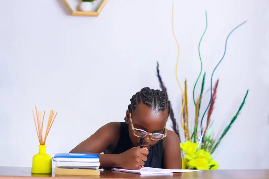 Student focused and writing during a study session